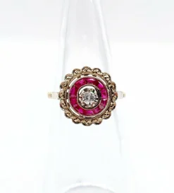 Bague cible Art Déco or rose, diamant, rubis calibrés (circa 1920)