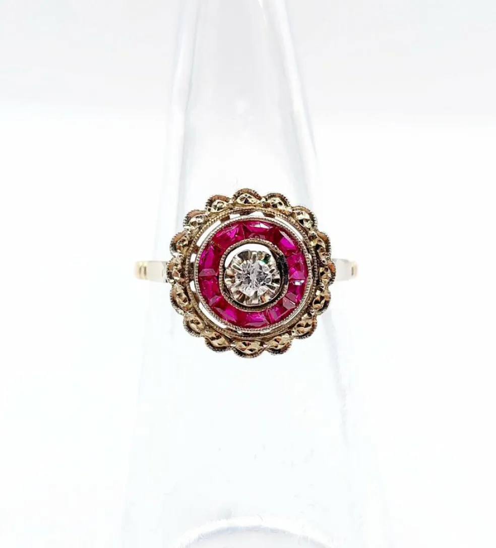 Bague cible Art Déco or rose, diamant, rubis calibrés (circa 1920)