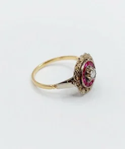 Bague cible Art Déco or rose, diamant, rubis calibrés (circa 1920)