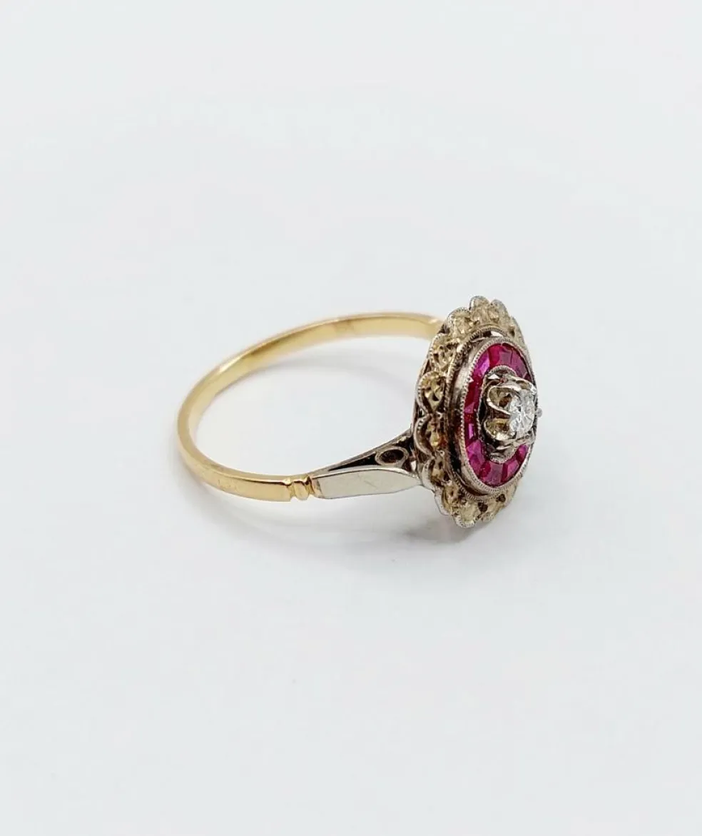 Bague cible Art Déco or rose, diamant, rubis calibrés (circa 1920)