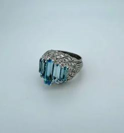 Bague cocktail or blanc et aigue-marines