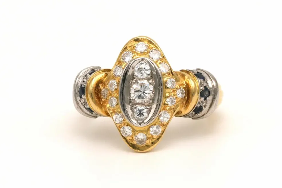 Bague contemporaine en or jaune et blanc 18 carats sertie d'un diamant (0.33ct)