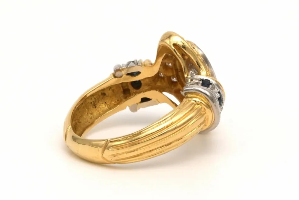 Bague contemporaine en or jaune et blanc 18 carats sertie d'un diamant (0.33ct)