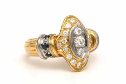 Bague contemporaine en or jaune et blanc 18 carats sertie d'un diamant (0.33ct)