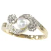 Bague croisée diamant et perle