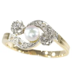 Bague croisée diamant et perle