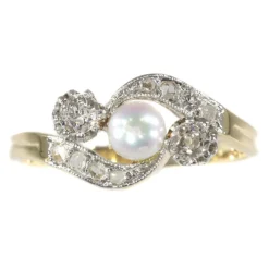 Bague croisée diamant et perle