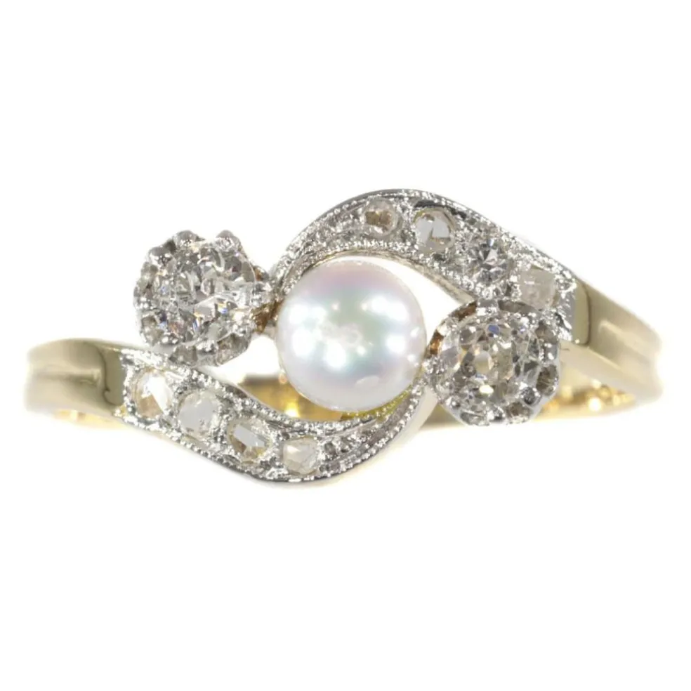 Bague croisée diamant et perle