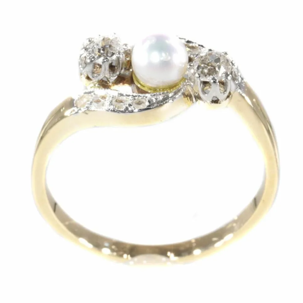 Bague croisée diamant et perle