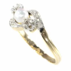 Bague croisée diamant et perle