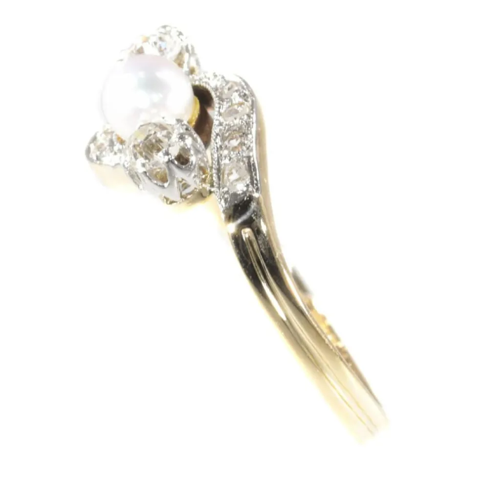 Bague croisée diamant et perle