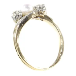 Bague croisée diamant et perle