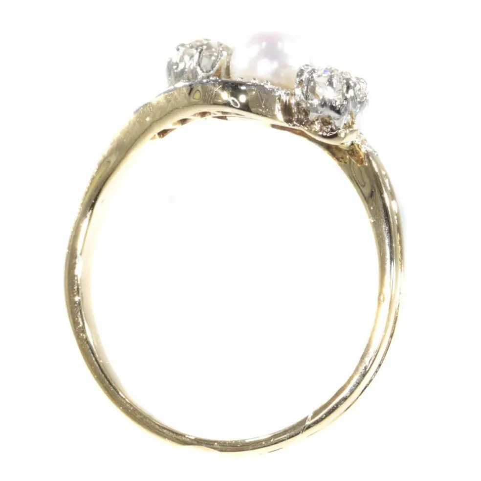 Bague croisée diamant et perle
