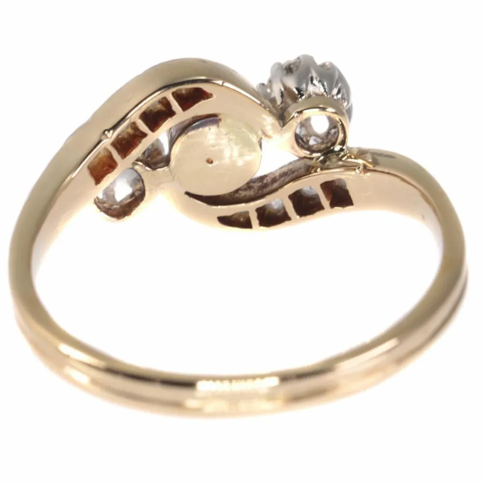 Bague croisée diamant et perle