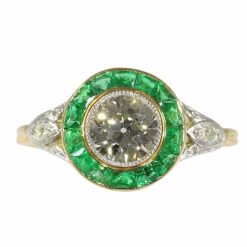 Bague de fiançailles Art Déco 1920 avec diamants et émeraude