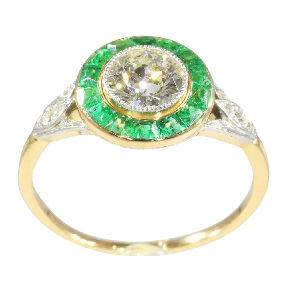Bague de fiançailles Art Déco 1920 avec diamants et émeraude