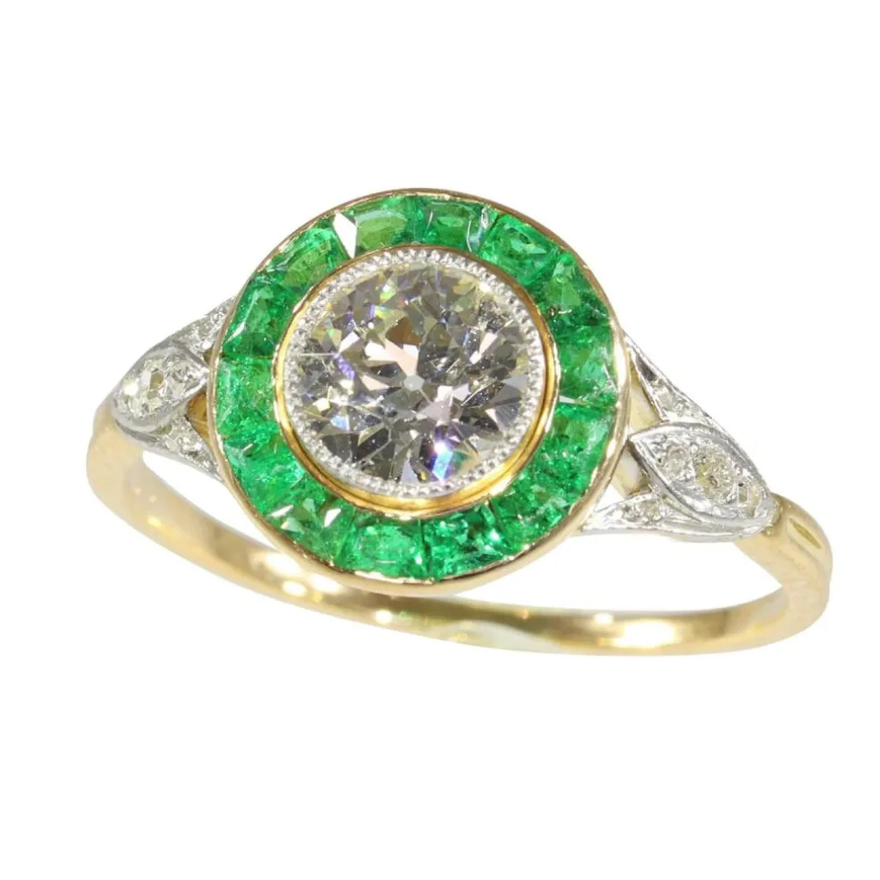 Bague de fiançailles Art Déco 1920 avec diamants et émeraude