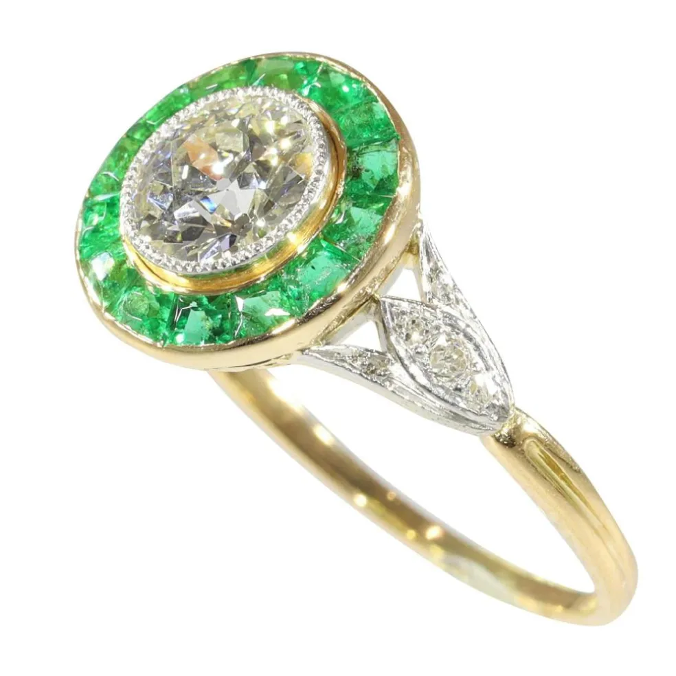 Bague de fiançailles Art Déco 1920 avec diamants et émeraude