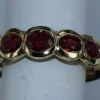 Bague demi alliance rubis ovales