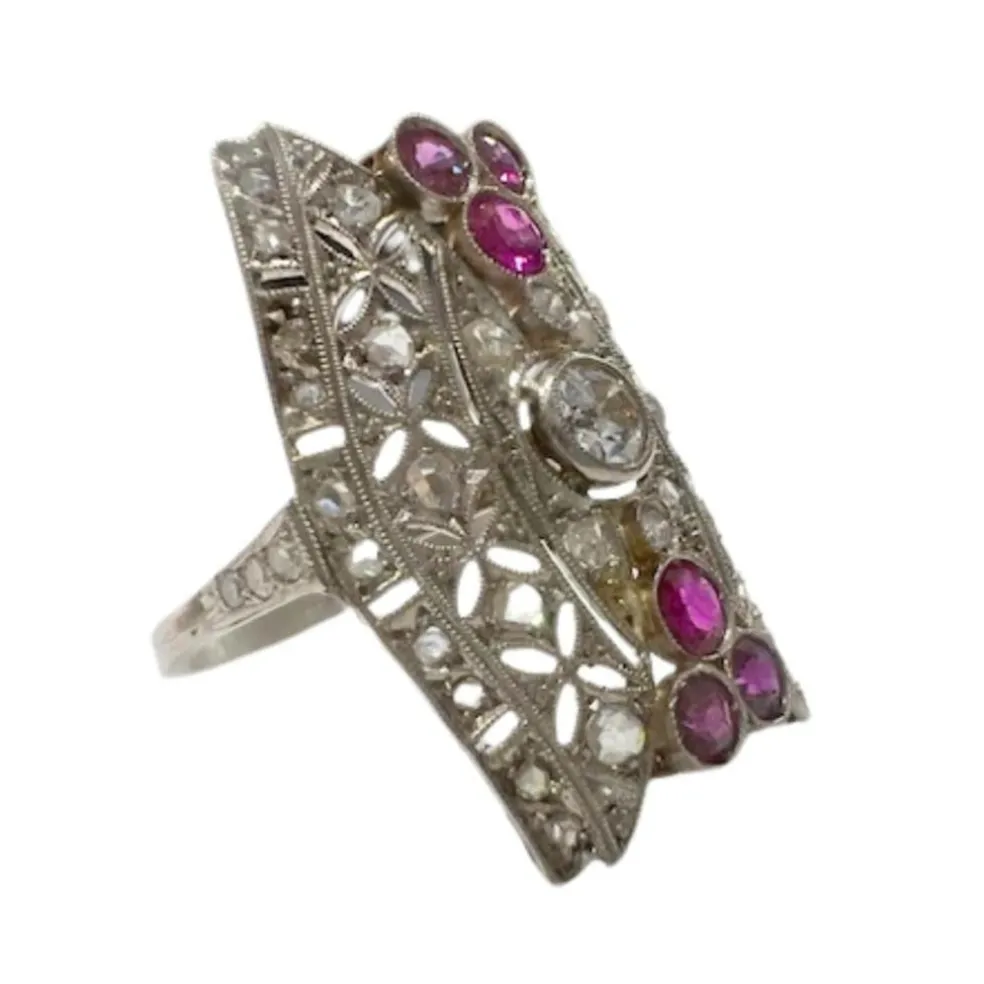 Bague design art déco en or 18 carats avec diamants et rubis