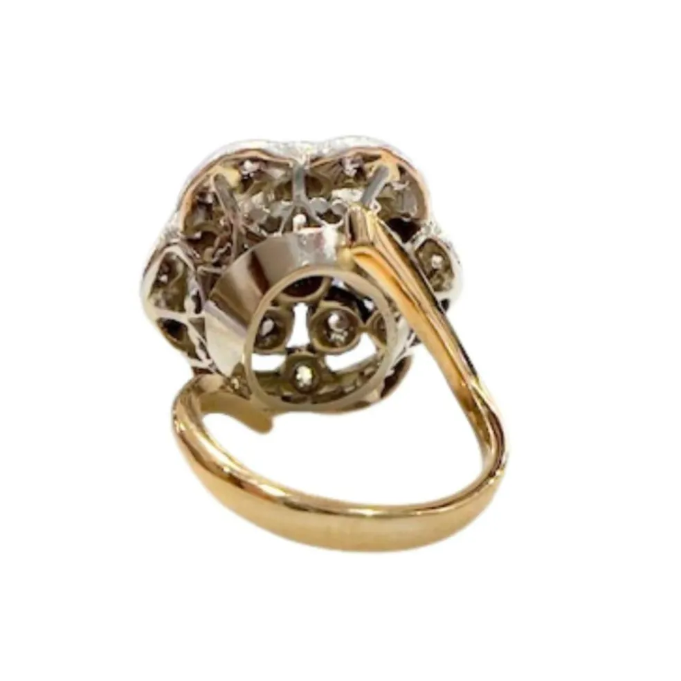 Bague design Art Déco en or et argent avec diamants et émeraude