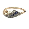 bague design en or et platine avec diamants et saphirs