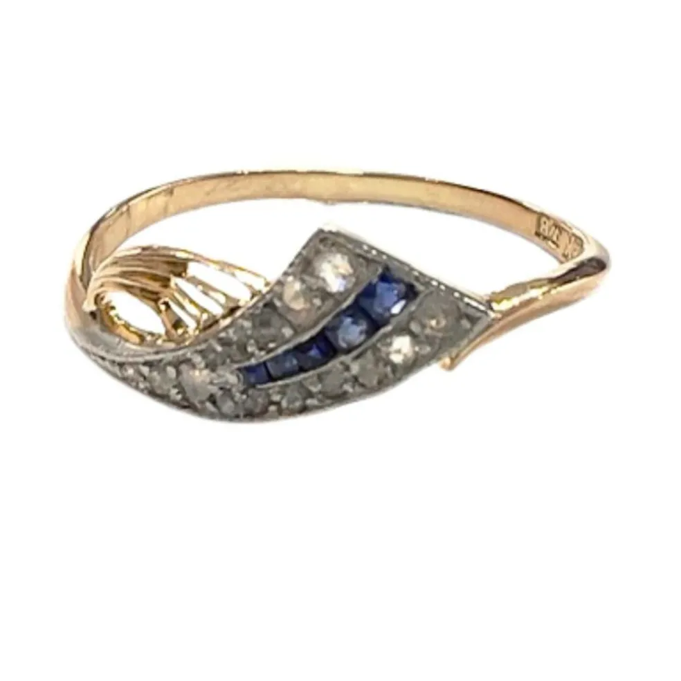 bague design en or et platine avec diamants et saphirs