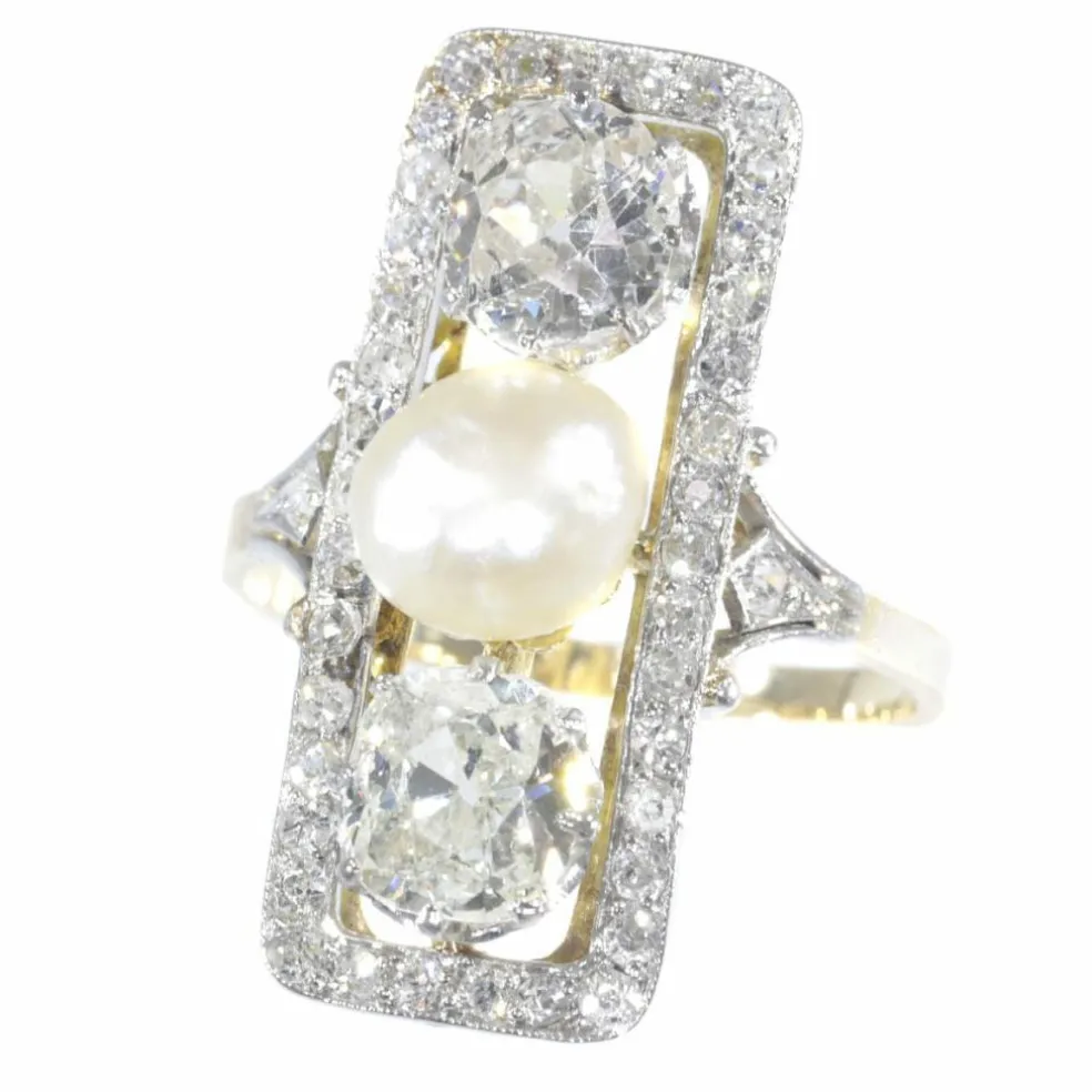 Bague diamant et perle