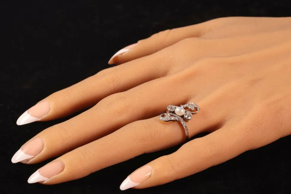 Bague diamant et perle
