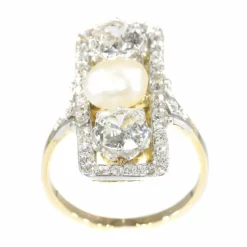 Bague diamant et perle