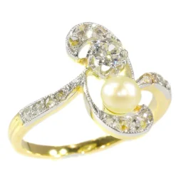 Bague diamant et perle