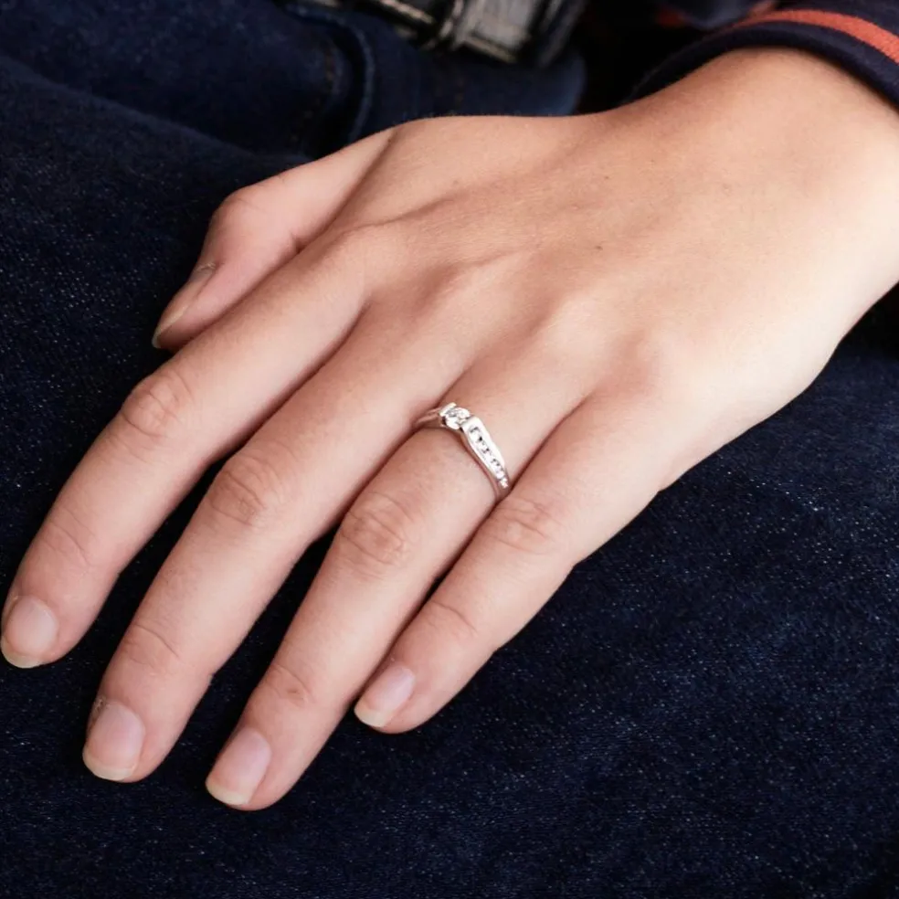 Bague diamant solitaire et pavage diamants