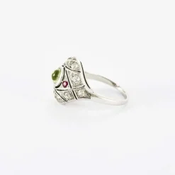 Bague dôme Art Déco diamants rubis péridot