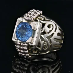 Bague dôme or ajourée et son aigue-marine