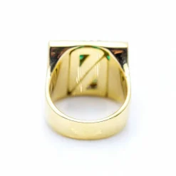 Bague d'or avec des diamants et des émeraudes