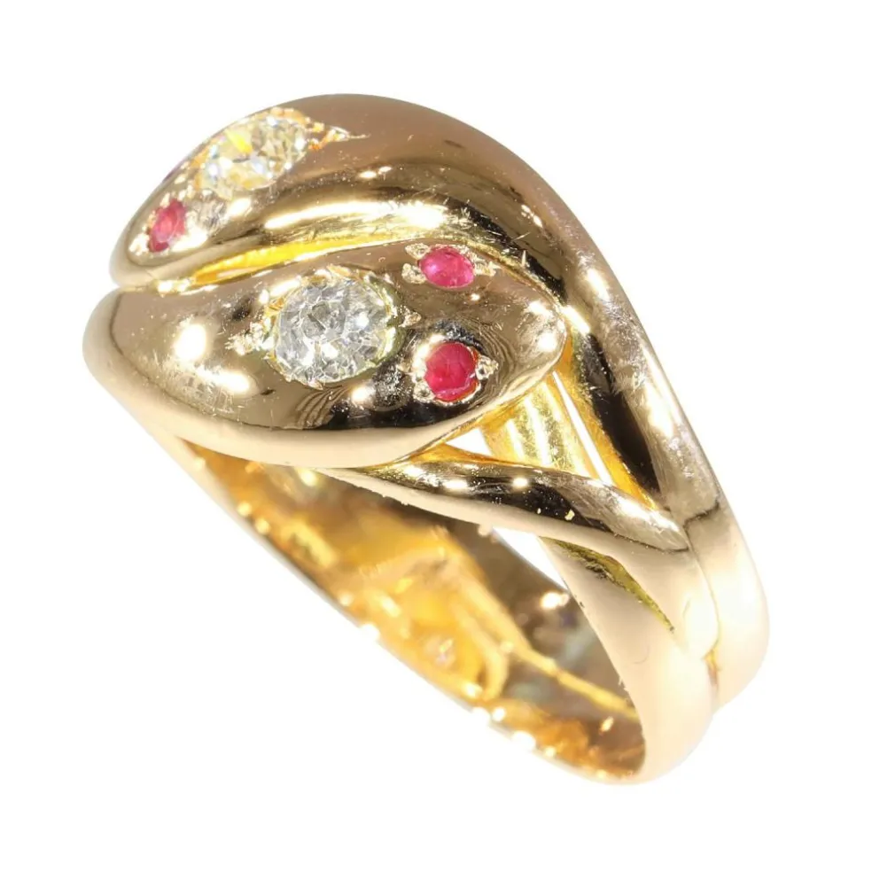 Bague double serpent de l'époque victorienne : symbole d'éternité avec diamants et rubis