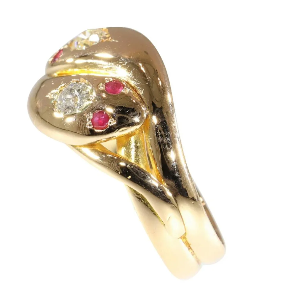 Bague double serpent de l'époque victorienne : symbole d'éternité avec diamants et rubis