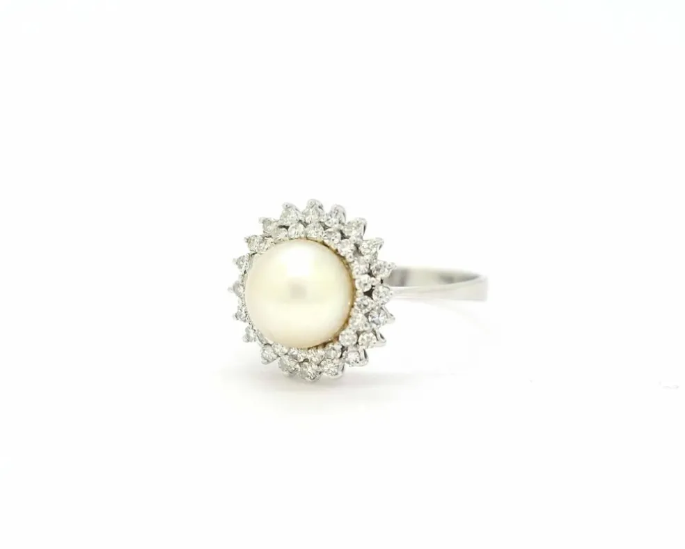 Bague double tour en perles et diamants