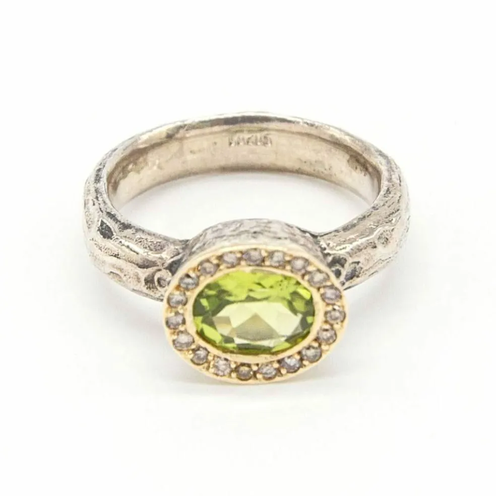 Bague en argent et or avec diamants et péridot