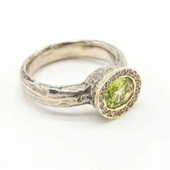 Bague en argent et or avec diamants et péridot
