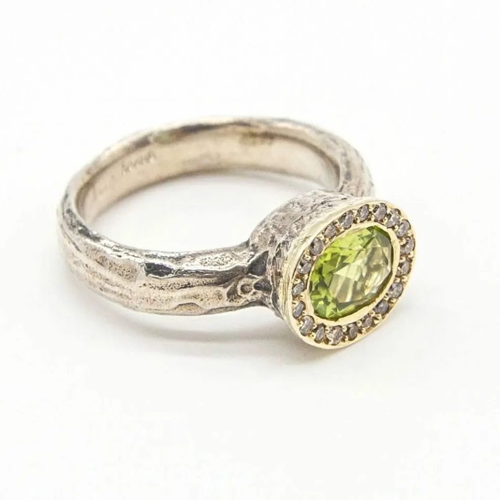 Bague en argent et or avec diamants et péridot