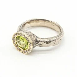 Bague en argent et or avec diamants et péridot