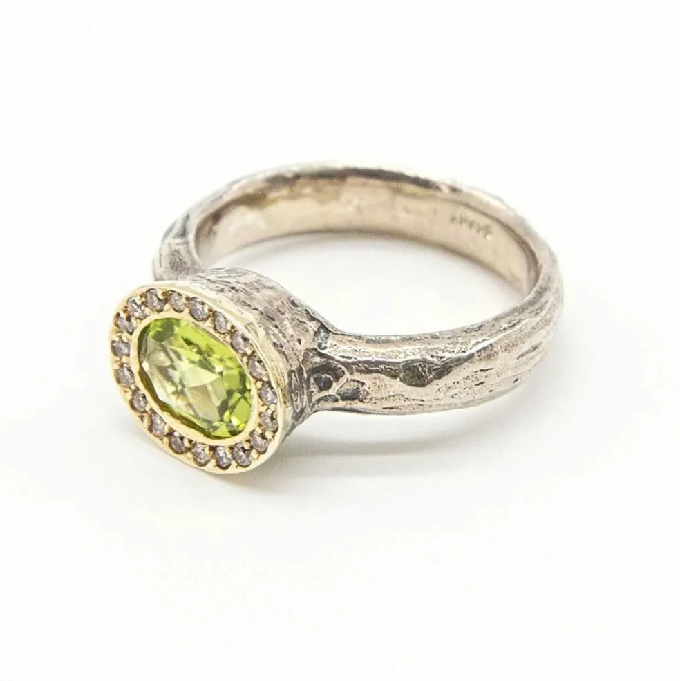 Bague en argent et or avec diamants et péridot