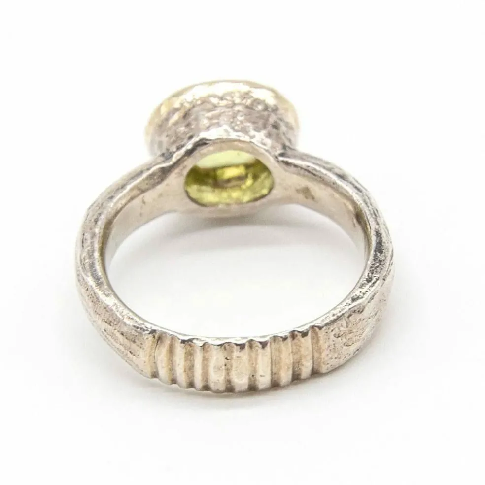 Bague en argent et or avec diamants et péridot