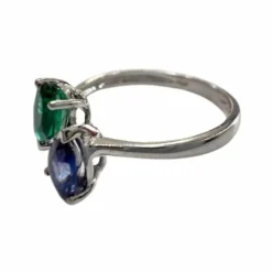 Bague en or au design moderne avec saphir et émeraude