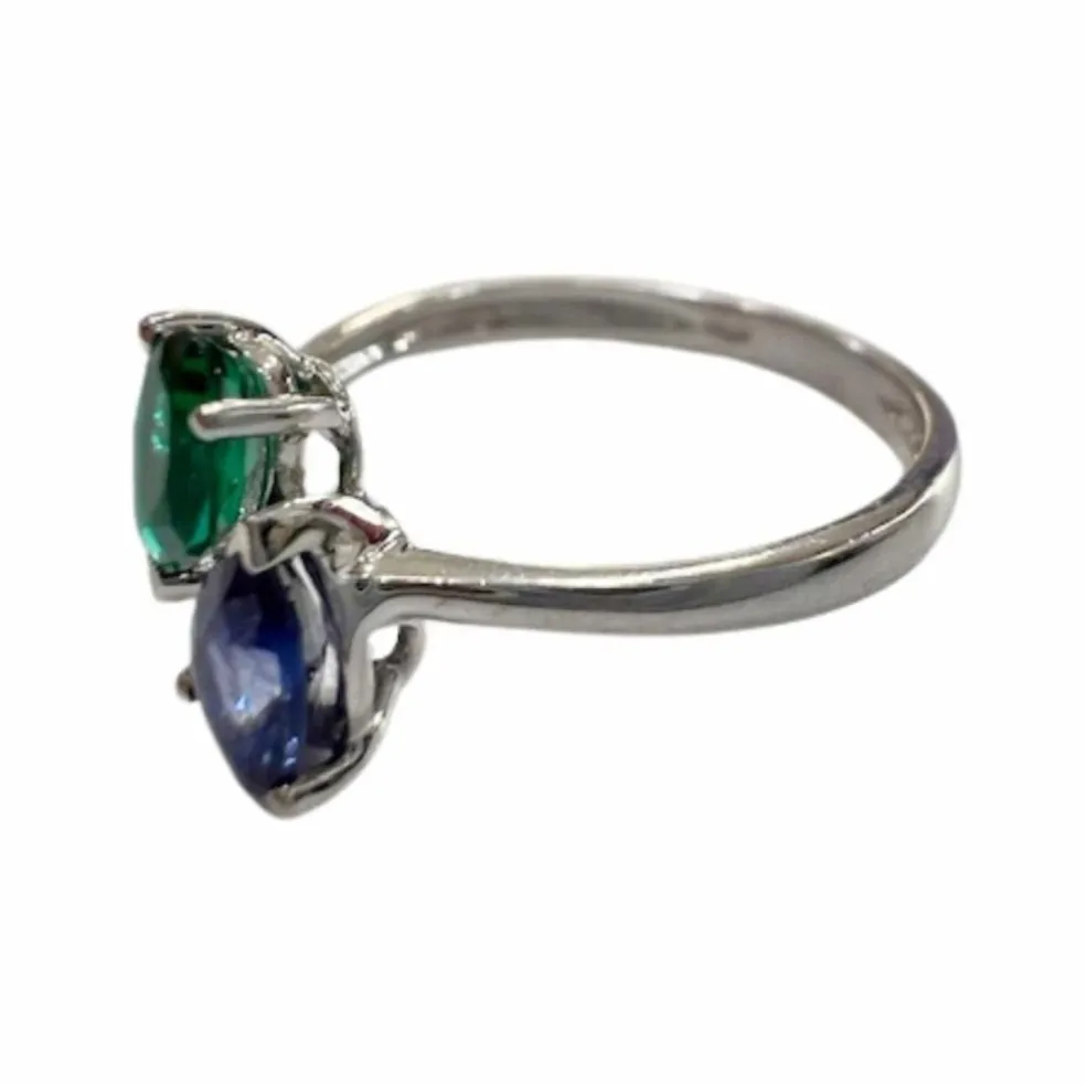 Bague en or au design moderne avec saphir et émeraude