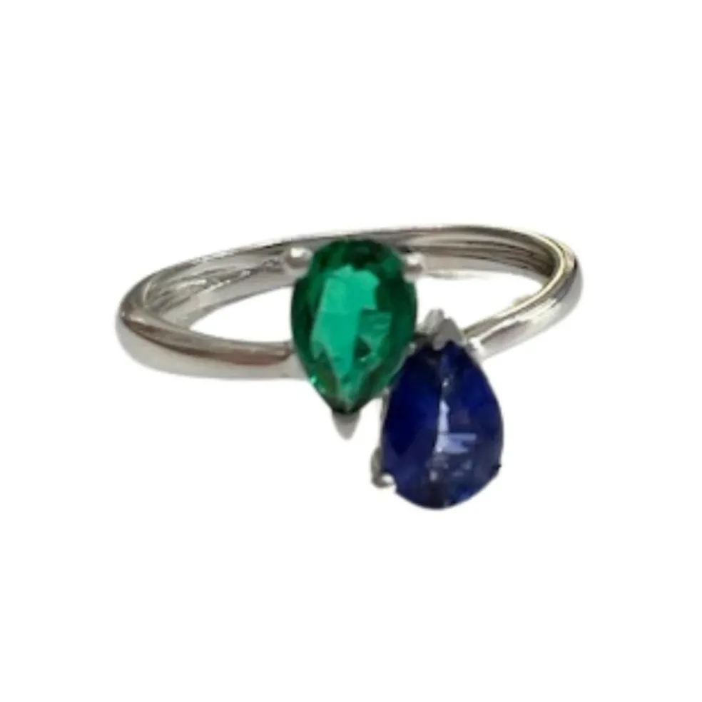 Bague en or au design moderne avec saphir et émeraude