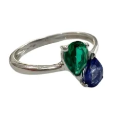 Bague en or au design moderne avec saphir et émeraude