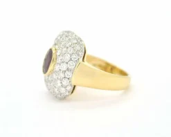 Bague en or avec rubis et diamants autour