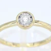 Bague en or avec un diamant taille brillant